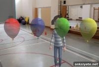 PopBalloons: First Mixed-Reality Game for Autism Therapy