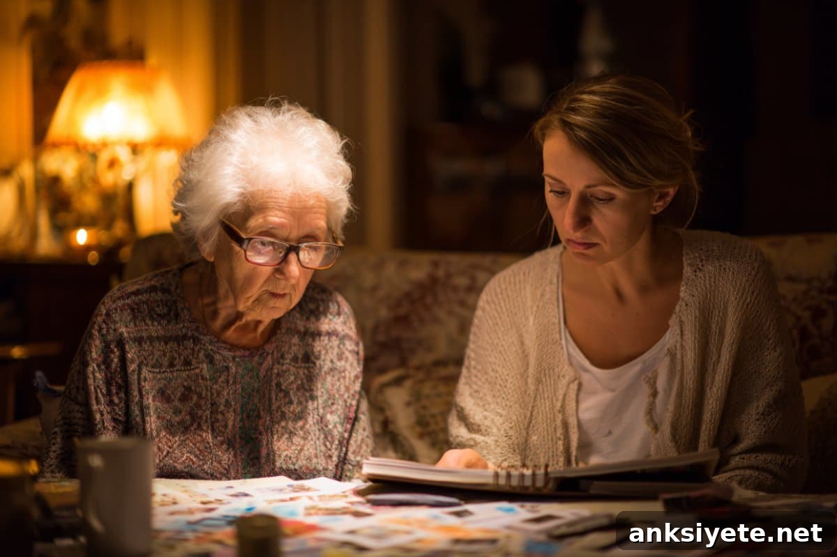 This shows an older woman looking through a photo album with her caregiver.
