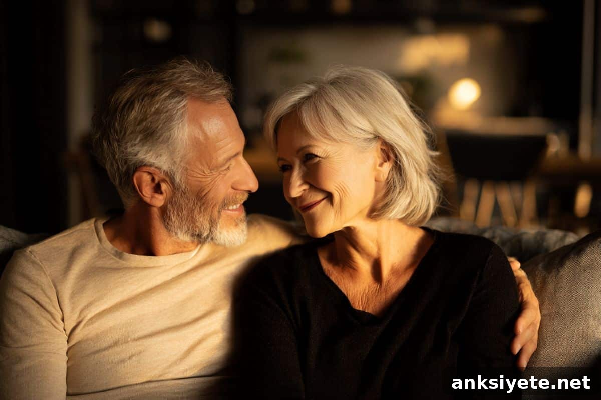 Why Older Adults Still Prioritize Passion in Later Life 2 This shows an older couple hugging on a sofa.