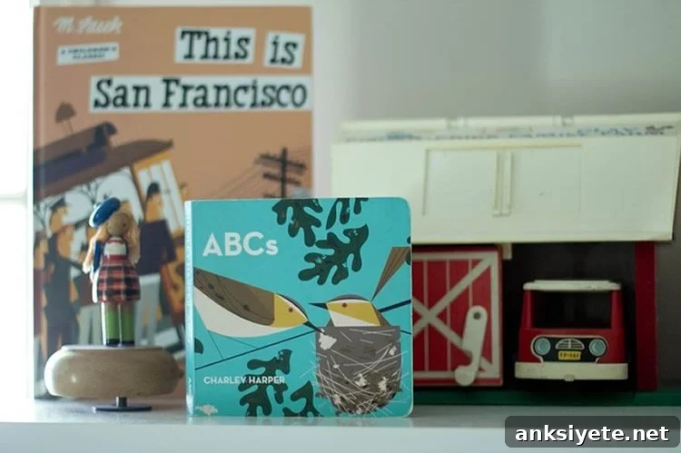 This image shows children's books and a toy truck.