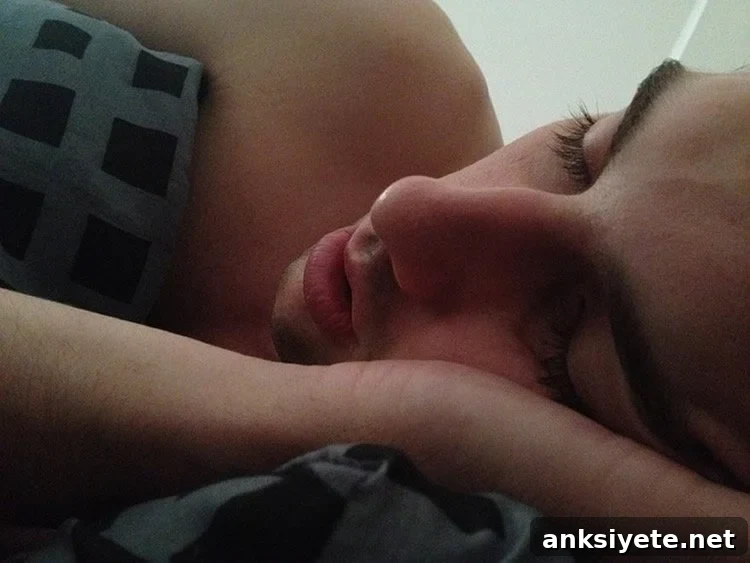 This image shows a sleeping man.
