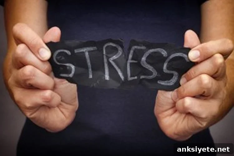 Image shows a woman ripping up a piece of paper with the word Stress written on it.