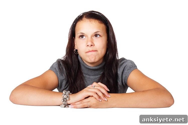 Image shows a hostile looking young woman.