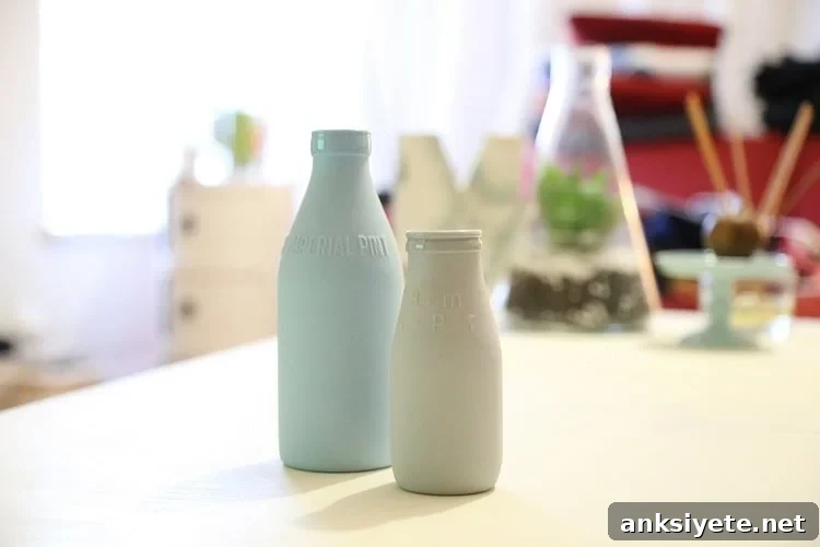 Image shows old fashioned milk bottles.