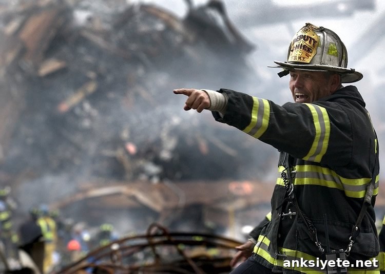 How 9/11 Affected Global Mental Health 2 Image shows a fire fighter in the rubble of the twin towers.