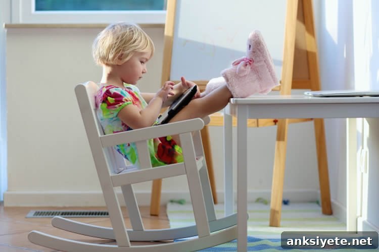 Touchscreen Play May Improve Toddlers' Motor Skills 2 Image shows a little girl playing with a tablet.