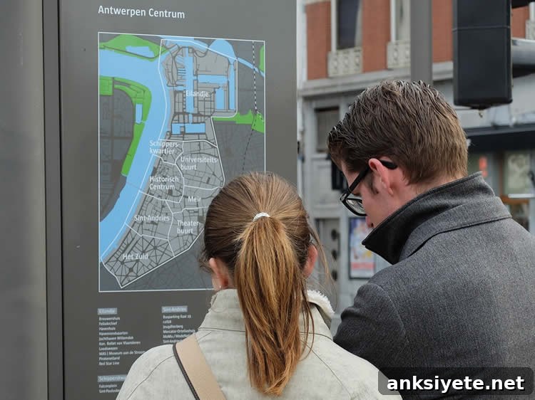 Image shows a woman looking at a map.