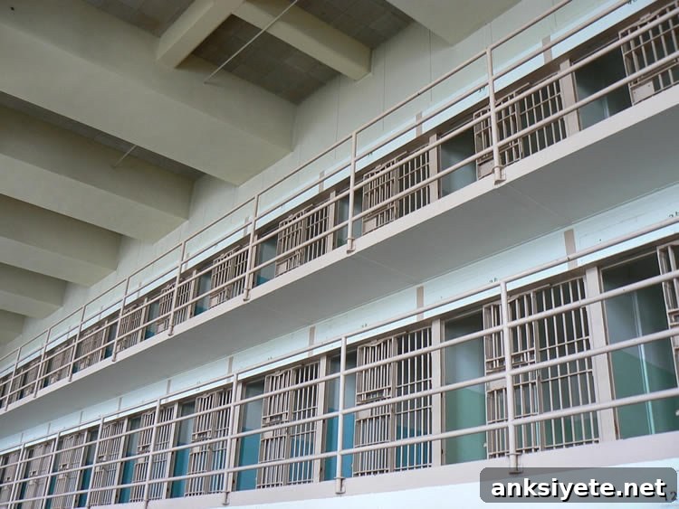 Image shows a prison cell.