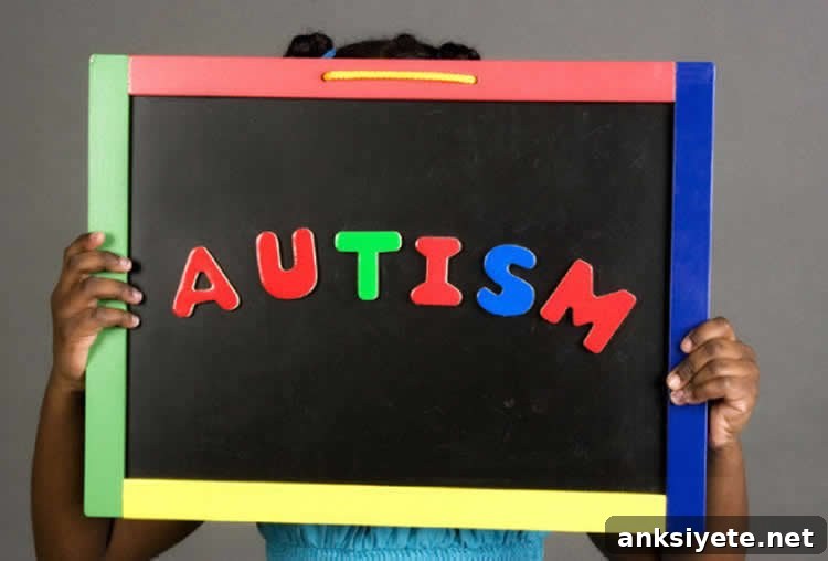 Image shows the word Autism on a blackboard.