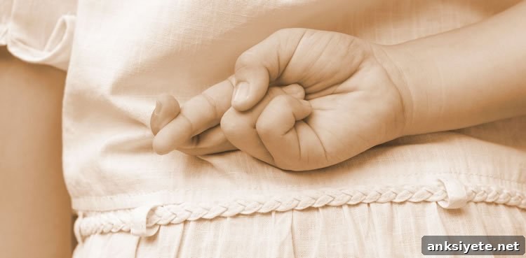 How Kids Learn to Lie and What Parents Can Do 2 Image shows a child with her fingers crossed behind her back.