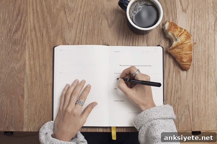 Image shows a person writing.