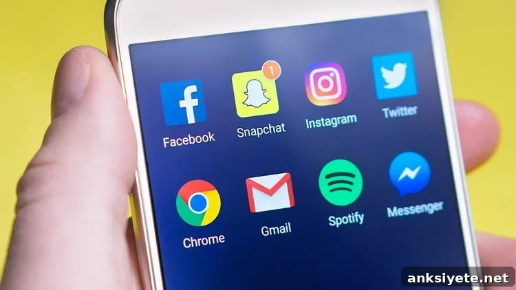 How Social Networking Boosts Mental and Physical Well-Being 2 social media icons on a smart phone
