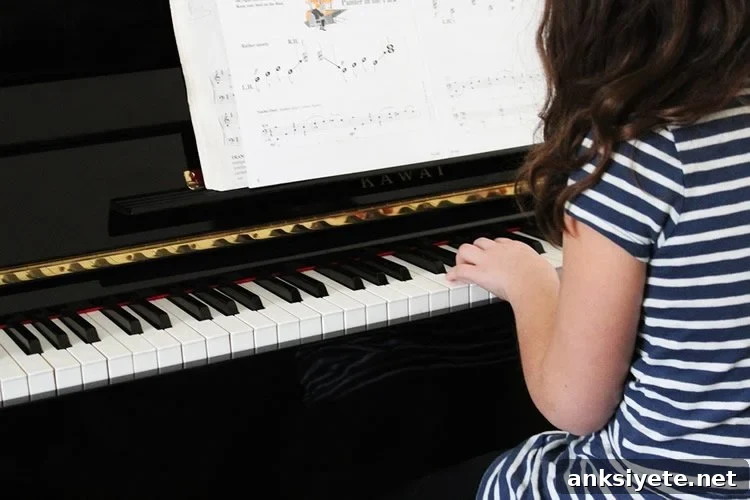 girl playing piano