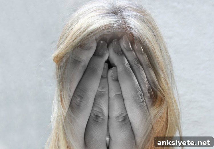 a woman holding her head