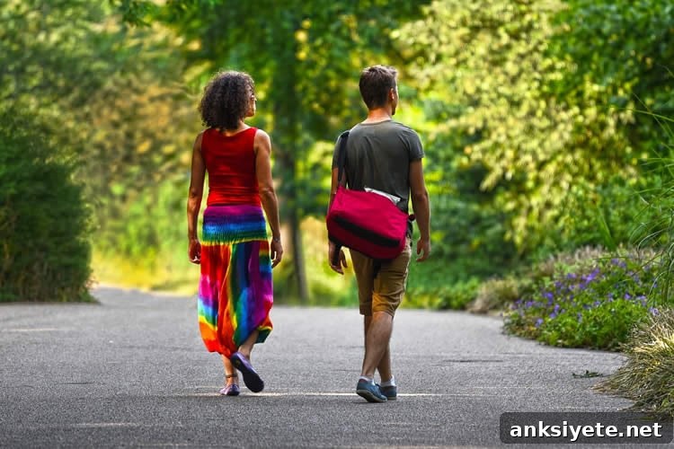 This shows an older couple taking a stroll in the park