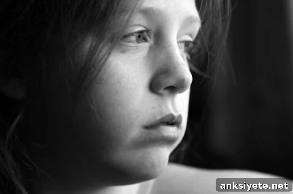 This shows a depressed looking little girl.