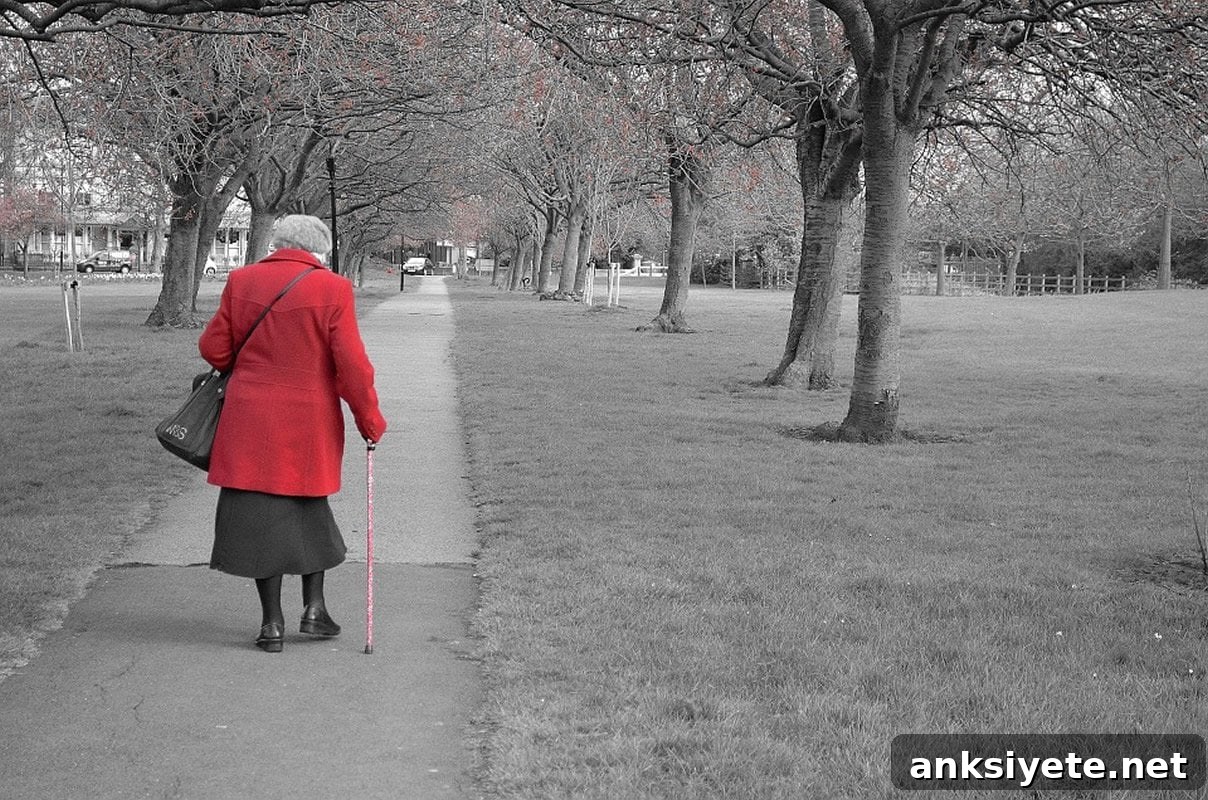 This shows an older woman walking in the park