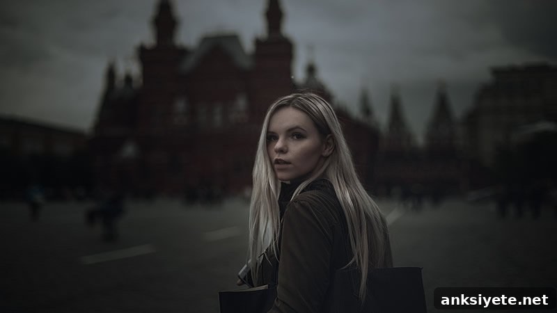 This shows a woman in a creepy house looking scared