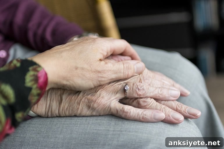 This shows an old womans hands