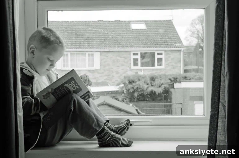 This shows a child reading at a window