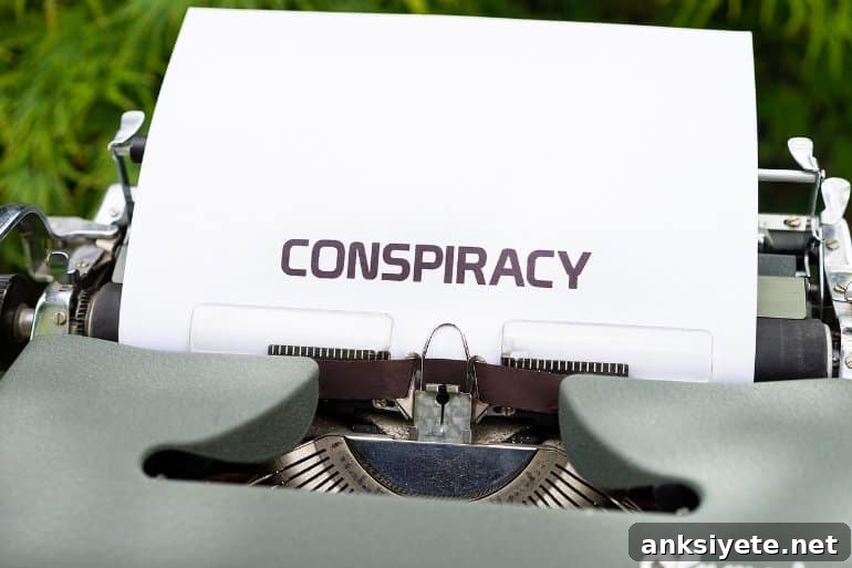This shows a typewriter with the word Conspiracy typed out on a piece of paper