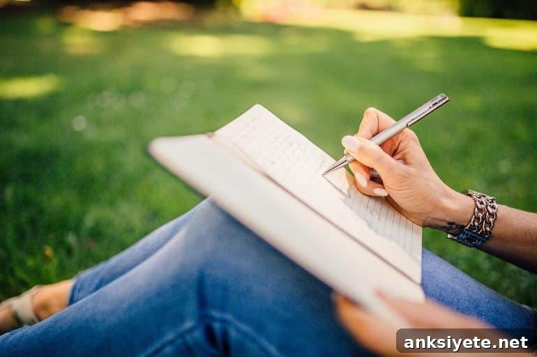 This shows a woman writing in what looks like a journal