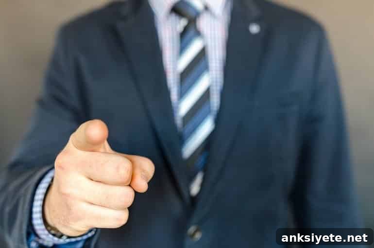 This shows a man in a suit pointing aggressively