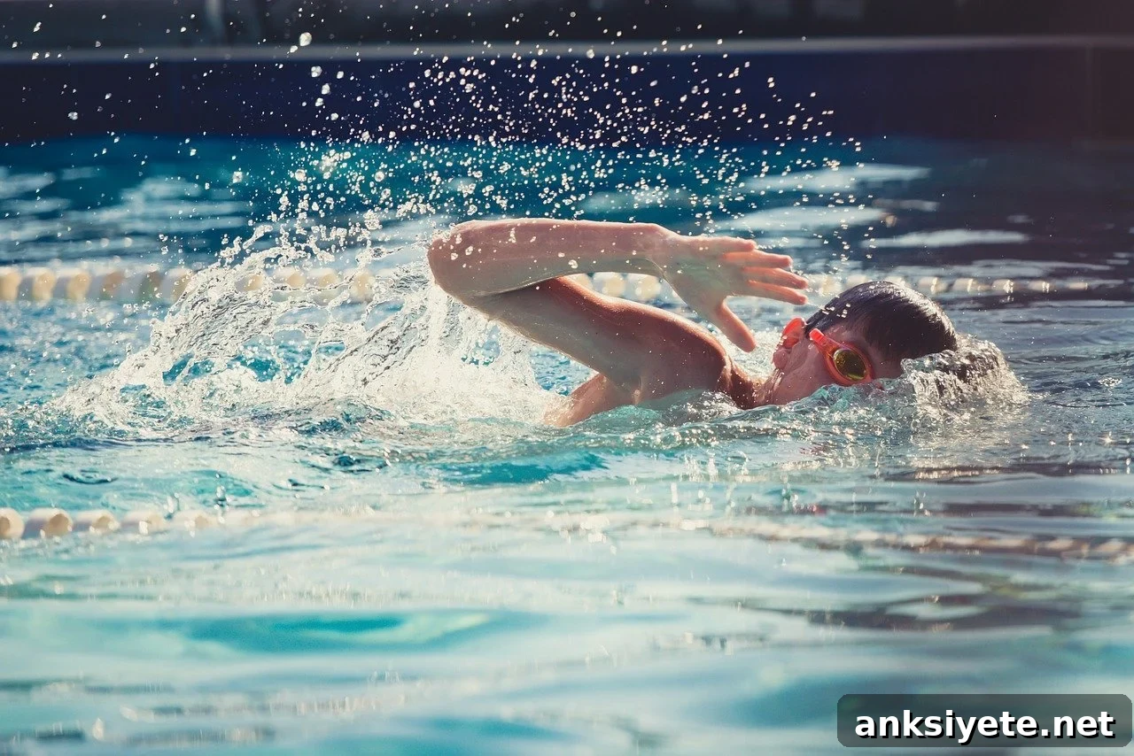 This shows a little boy swimming
