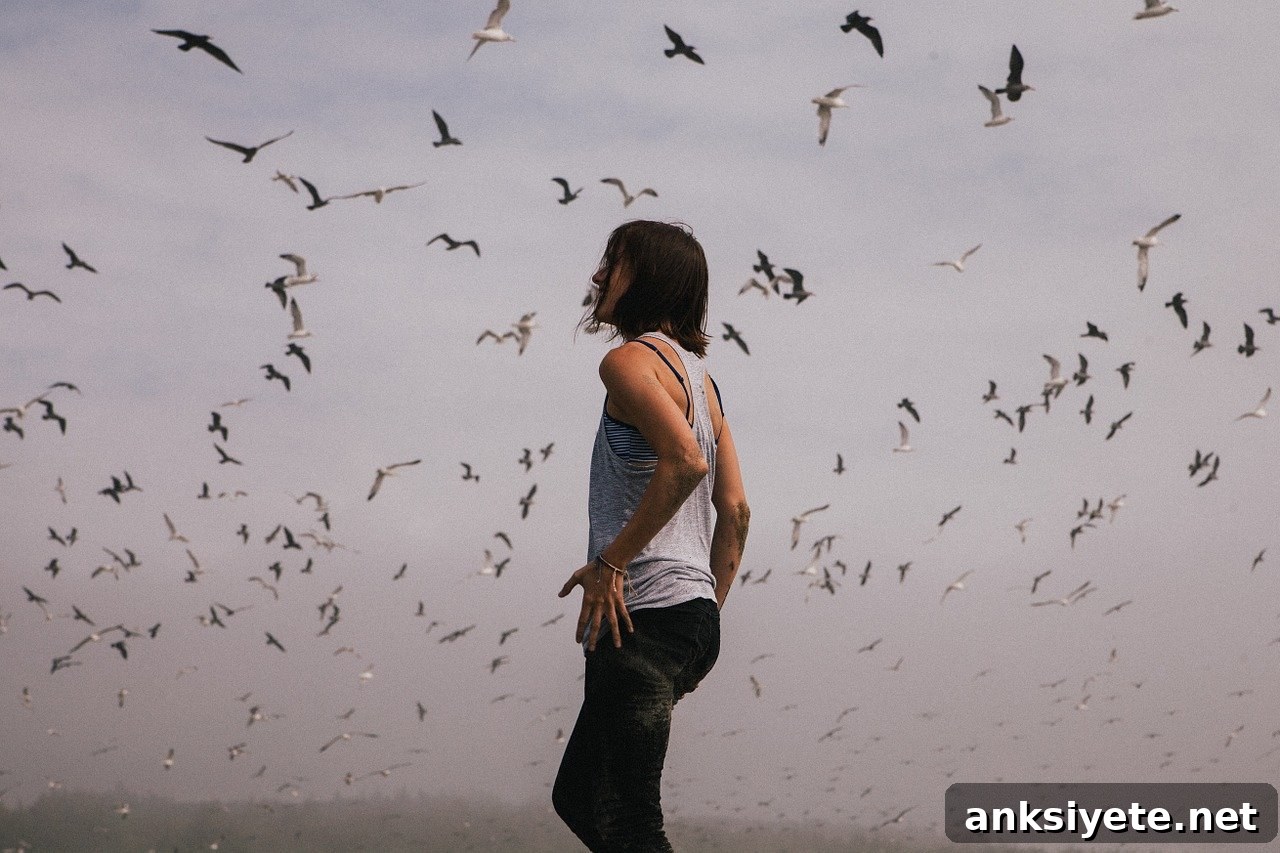 This shows a woman surrounded by birds