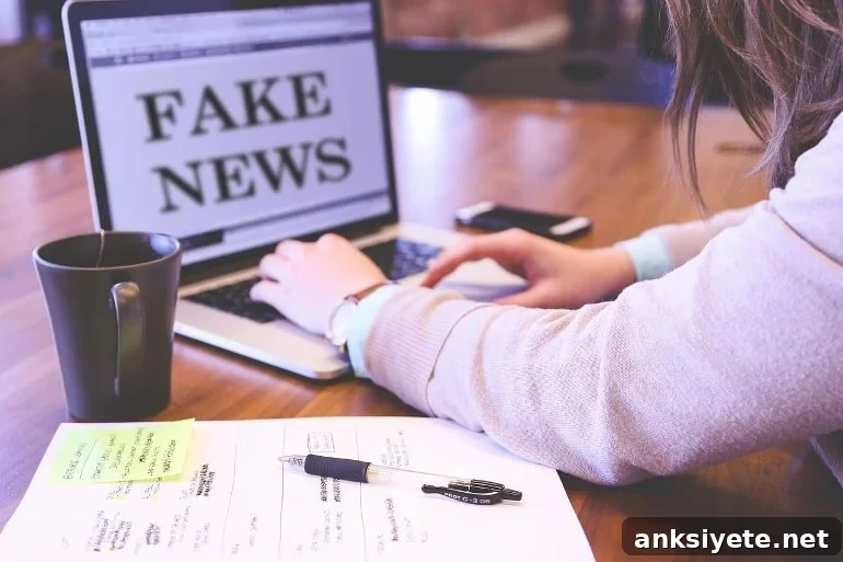 This shows a woman looking at a computer with the words "fake news" written on it