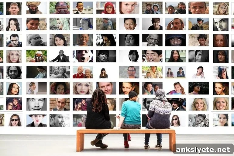 This shows three people viewing other people's faces in an art gallery