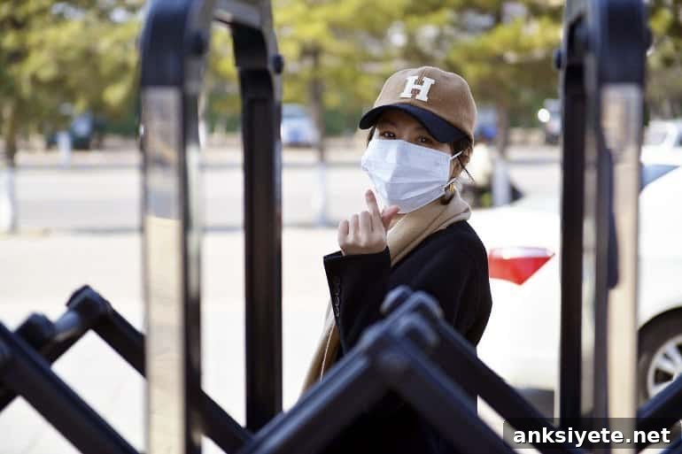 This shows a woman in a facemask