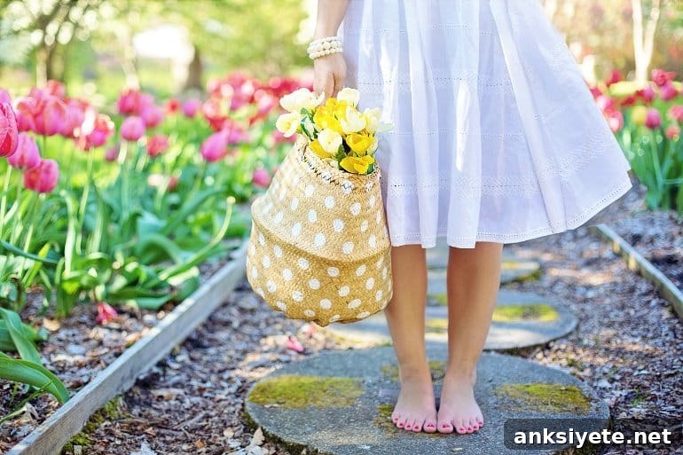 This shows a woman with a bag of tulips